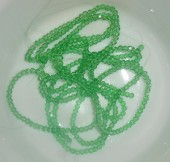 Margele sticla abac fatetate 3x2mm verde deschis transparent - sirag cca 185buc