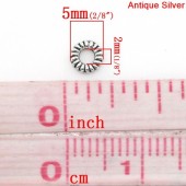 Conectori mici argintiu antichizat cu dungi 5mm diam. - cca 95 buc